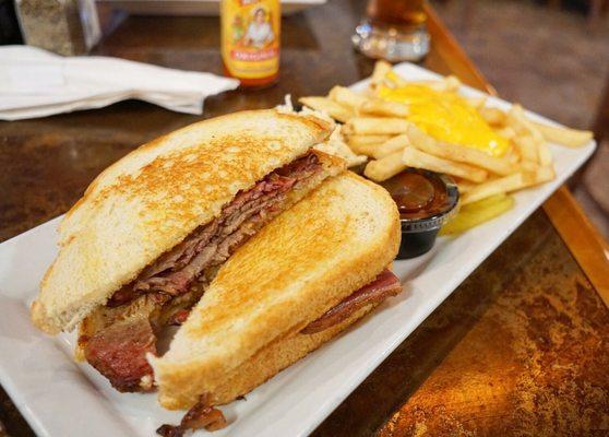 Brisket sandwich with cheddar fries