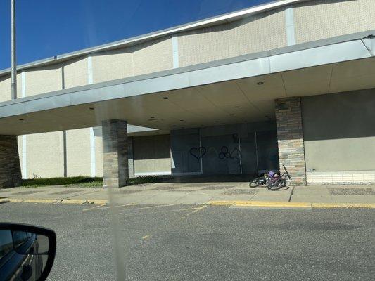 Boarded up front entrance to building that used to house St. Paul License Bureau.