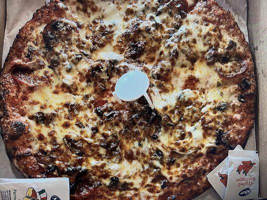 Pizza Zone N Grill's pepperoni and mushroom pizza.