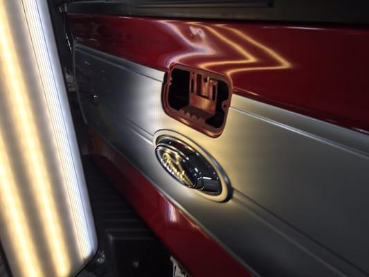 Dent in tailgate, www.217dent.com Paintless dent removal, Springfield Illinois