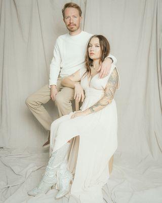 My fiance and I posing for engagement photos, shot by Felicia