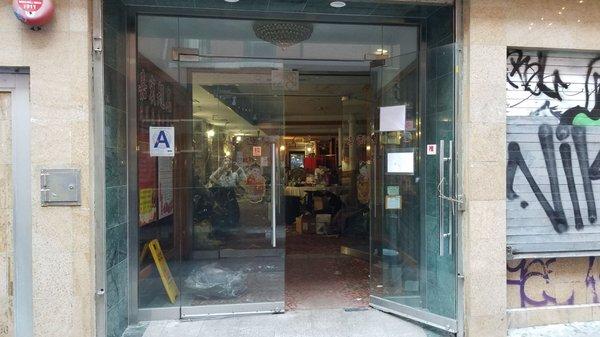 The workmen are hauling out the dishes and utensils.