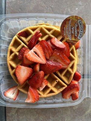 Waffle with fresh strawberries, whipped cream, and powdered sugar...only not.