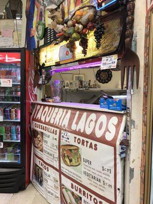 A taqueria inside a corner market.