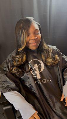 Side part with faux blonde highlights