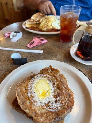 Two eggs over medium, hash browns, bacon and toast....and delicious French Toast!
