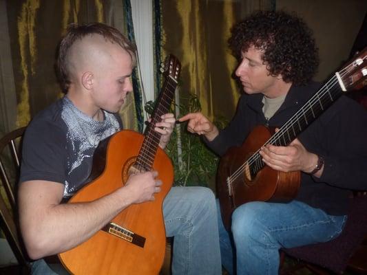 Student Charles getting a point of advise from Mark during a lesson.