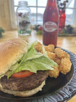 Larger hamburger and tots.