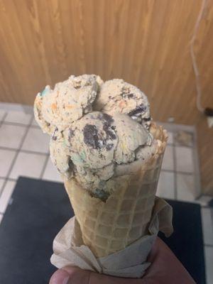 Pirates Bounty ice Cream in a waffle cone (Cookie dough with M&Ms)