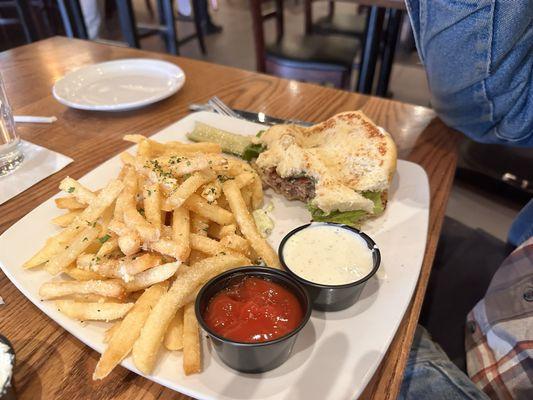 Bison Burger with truffle fries -- sorry for the pic it was so good he had already eaten half of it.