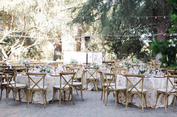Our vintage cross-back chairs are perfect for your indoor and outdoor reception.