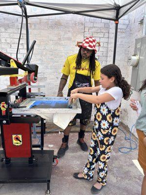 Hands-on silkscreen booth.