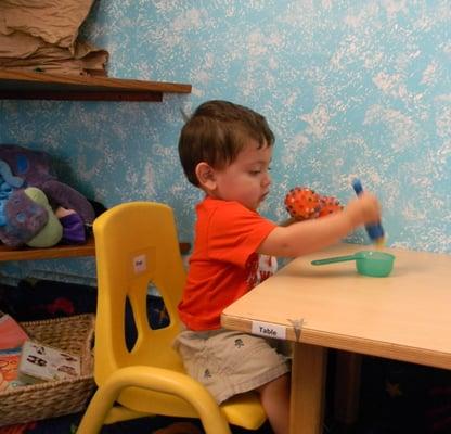 This little one was so engaged in his play time.