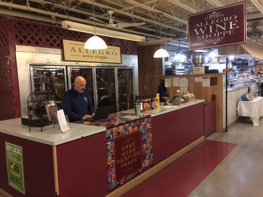 Allegro Winery sales booth and tasting bar at the West Shore Farmers Market.
