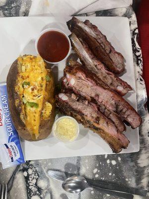 2 Meat Sampler with double portion of ribs and loaded baked potatoe