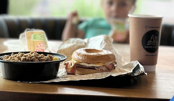 Breakfast bowl, egg sandwich and coffee
