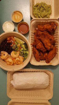 Wings, steak burrito, shrimp bowl, guac and sauces