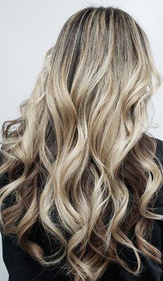 Dimensional blonde done with a partial highlight.