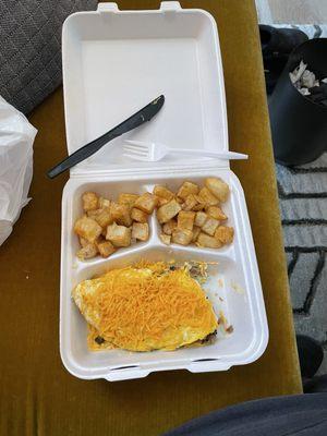 Omelette with ham, sausage, mushroom, and onion. Was very good.