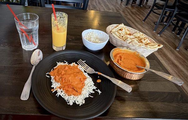Butter chicken, naan, mango lassi.