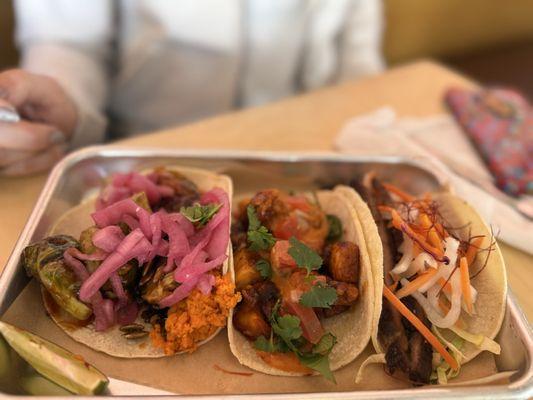 L-R Brussels Sprouts taco Chicken Al Pastor Taco Banh Mi Taco