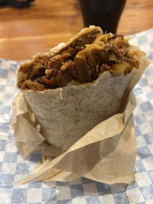 California burrito with Al pastor, chorizo, fries, cheese, sour cream and chipotle sauce.