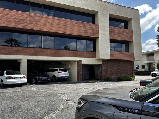 Parking is in the back. Stairs & elevator to Floors 1 & 2.