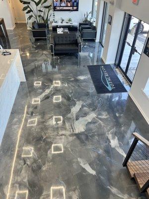 Polished concrete with an epoxy finish