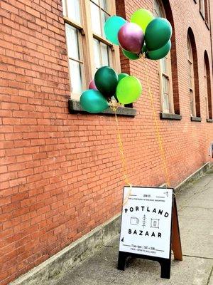 Look for the sign and balloons!