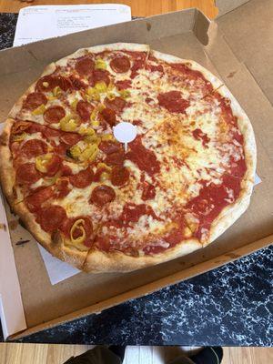 Half pepperoni and banana peppers large pie