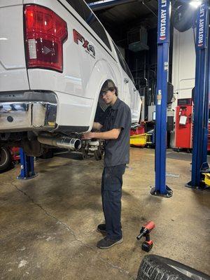 Mack is changing rear brakes on this F-150