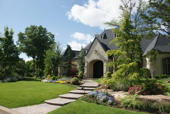 walkway designed and landscape installed by scapes, inc. for a residential client in edmond oklahoma