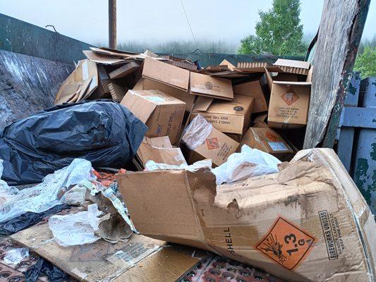 Trash from firework boxes at the town dump