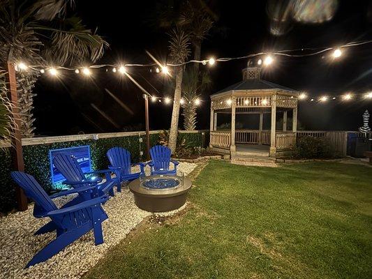 Outdoor area with fire pit that they turn on by request