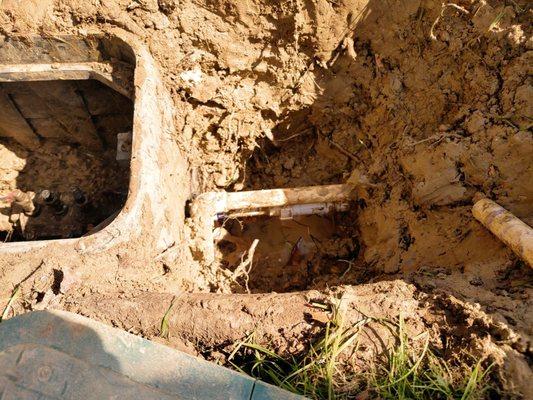 Broken line getting dug up and repaired