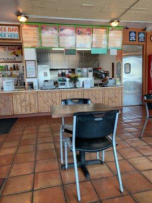 The order counter and kitchen in back