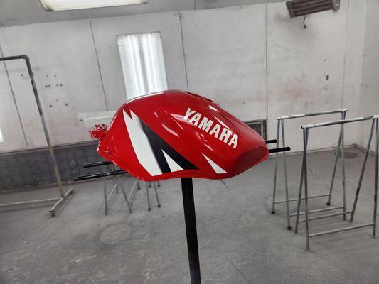 Factory motorcycle tank repainted.