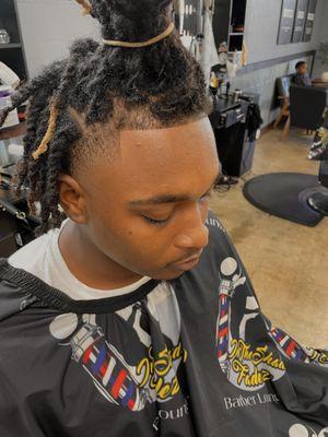 In The Shadow Fadez Barber Lounge