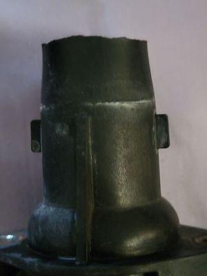 The sawed off housing. The new part has about 4 inches more sticking up (Dorman water outlet part number 902-313)