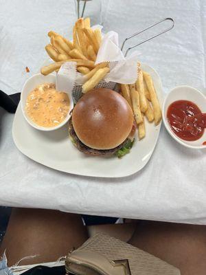 Bayou Burger with the special cheese sauce on the side. Cute ketchup bowl.