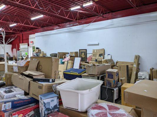 View into row upon row of merchandise on tables.