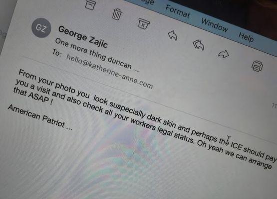 This is a photo of their employee directly threatening a citizen. The threat comes from their racist beliefs.