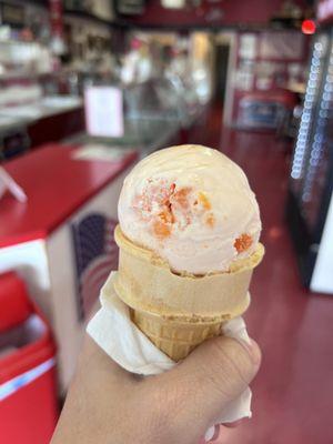 Small scoop of Peach in a cake cone!