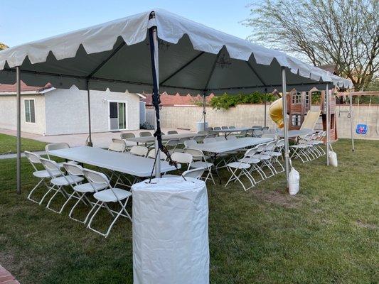 Set up day before. They don't set up the tables/chairs, but they do set up the canopy/barrels/lights