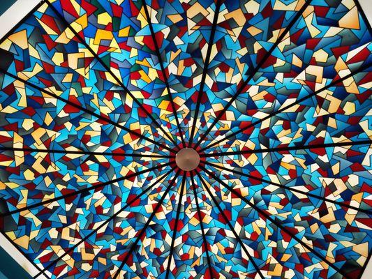 The beautiful stain glass like ceiling