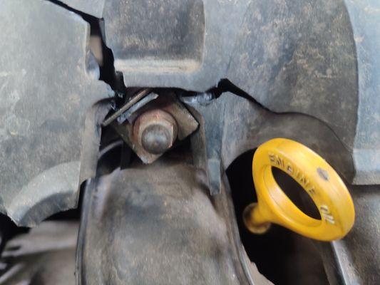 Damaged engine cover