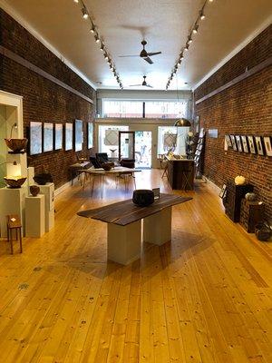 Beautifully restored historic brick building houses LeeAnn Brook Fine Art, featuring monthly art shows