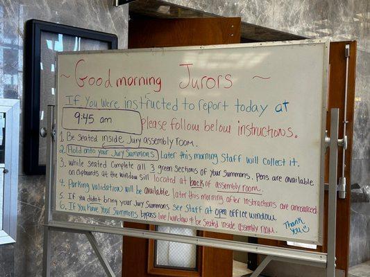 Here is the whiteboard with information/steps for the jurors to follow.
