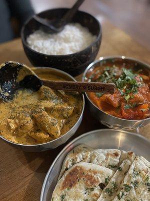 Left: butter chicken Right: vindaloo with chicken Bottom: garlic naan