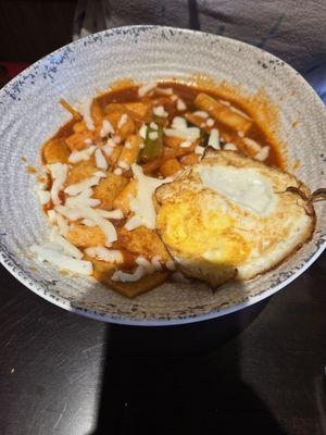 Tteokbokki with fried egg. (They forgot the veggie dumplings but they brought them out without issue when asked)